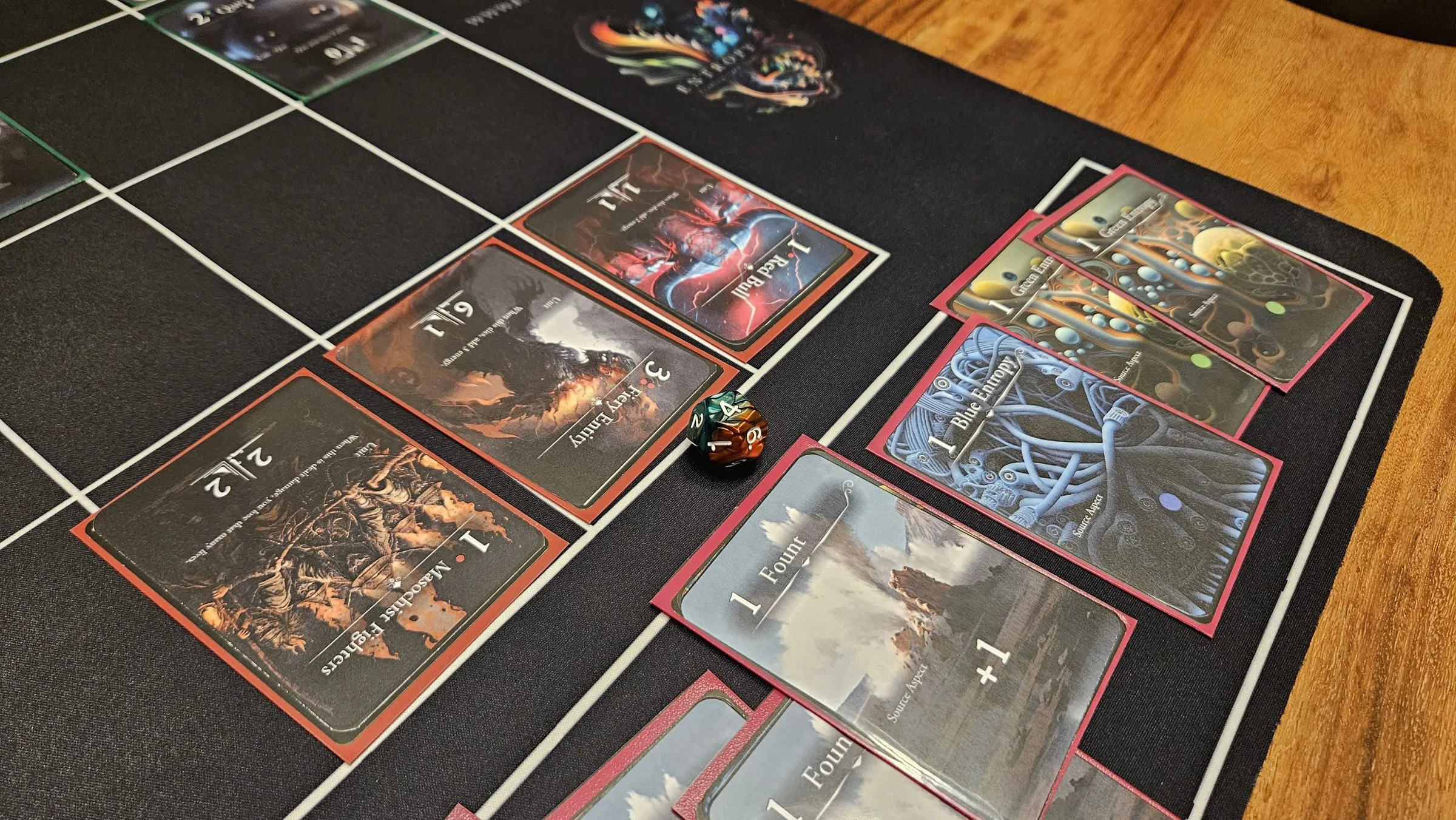 Close-up of Entropy cards in play